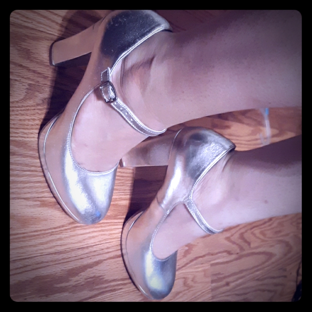 Silver high heels.